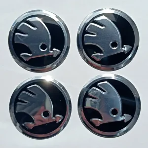 4x ALUMINIOWE NAKLEJKI EMBLEMATY NA KOŁPAKI DEKIELKI FELGI SKODA 56 mm Oferta